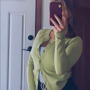 Super cute button up green sweater!
